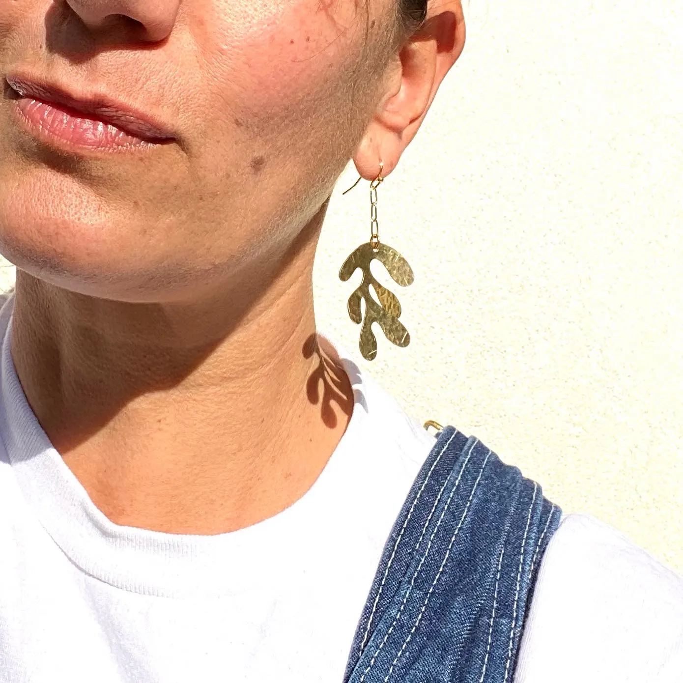 Large modern hand hammered leaf earring